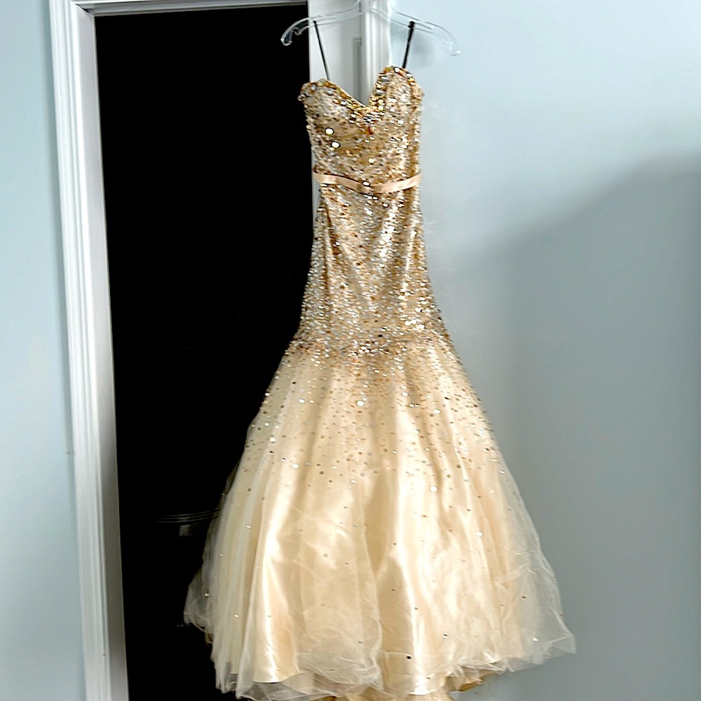 Prom dress. Bella is the designer. Juniors size 4.  Champagne color.